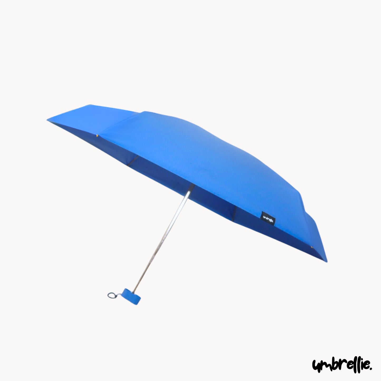 THE UMBRELLIE - World's Smallest Umbrella